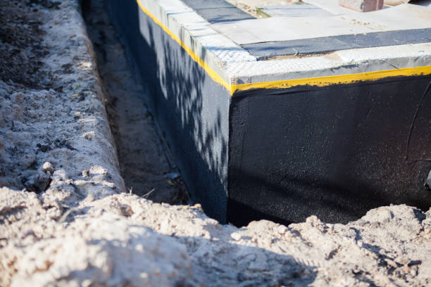 Professional Waterproofing technician working in Gasport, NY